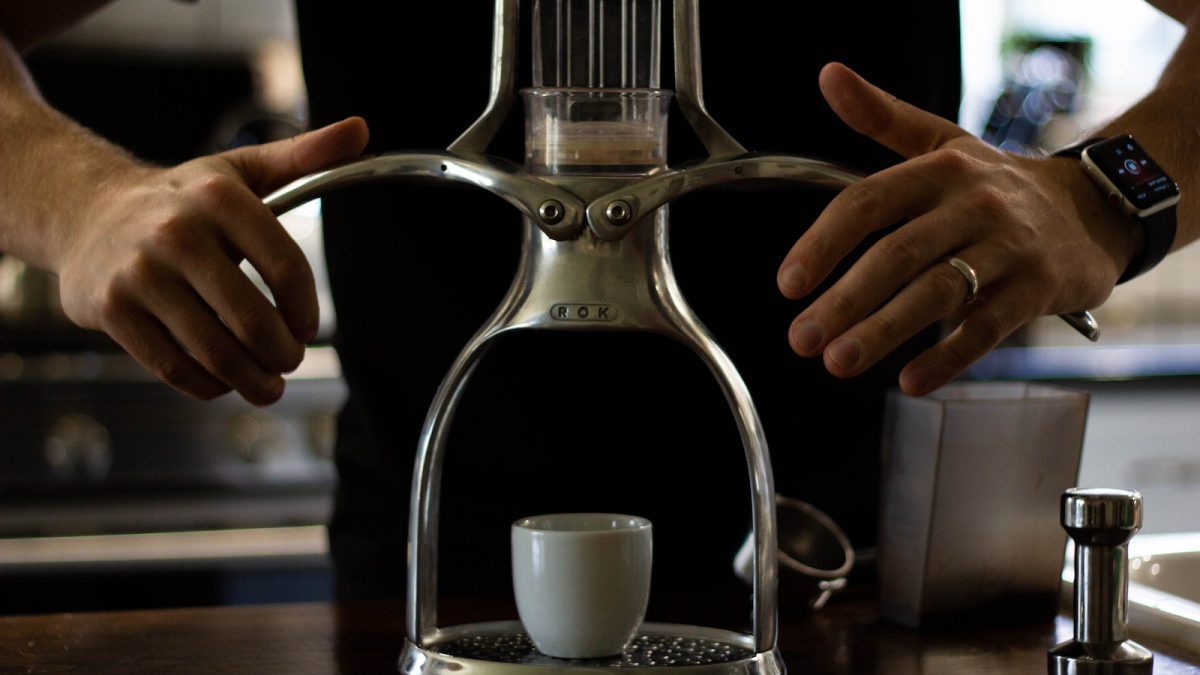 Man using Coffee press machine