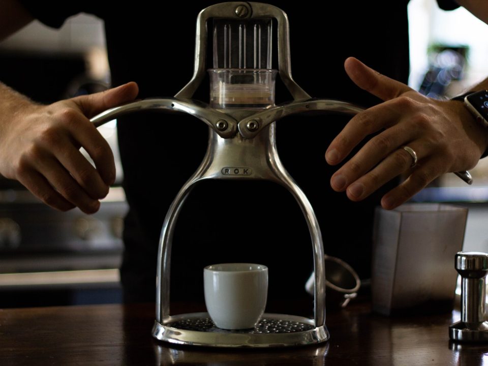 Man using Coffee press machine